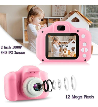 A child holding a blue digital camera with a 2.0 inch screen, displaying a smiling face on the screen.