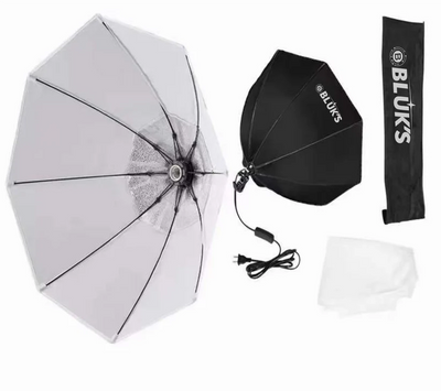Set of BLUKS umbrellas including a black umbrella, white cover, and branded strap on a white background.