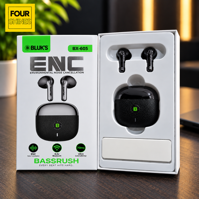 Open retail packaging for BLUK'S Bassrush ENC true wireless earbuds model BX-605, showing the white box front and the inner tray holding the black earbuds and charging case on a wooden tabletop.