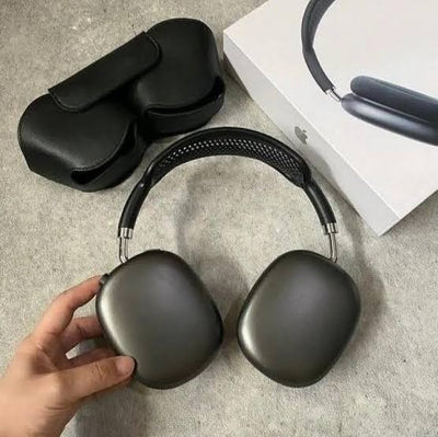 A pair of gray Apple AirPods Max colon wireless Bluetooth headphones with their smart case and packaging box.