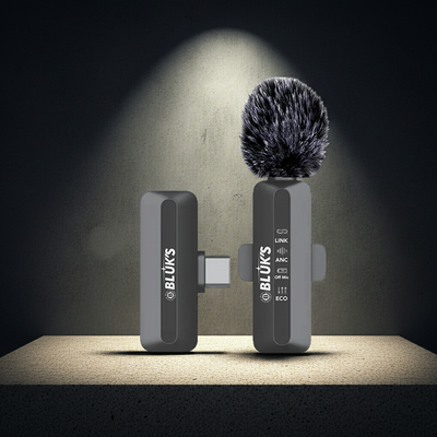 Bluks audio device with microphone on a dark background