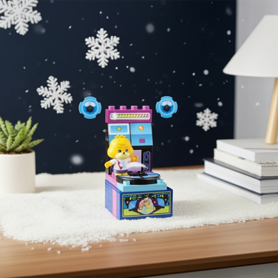 Toy figure in a colorful vehicle on a table with decorative snowflakes and books in the background