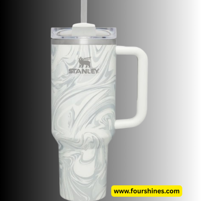 Marble-patterned tumbler with handle and Stanley logo on a gray background