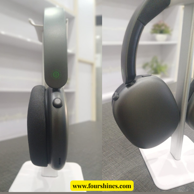 Black headphones on a stand with a blurred background