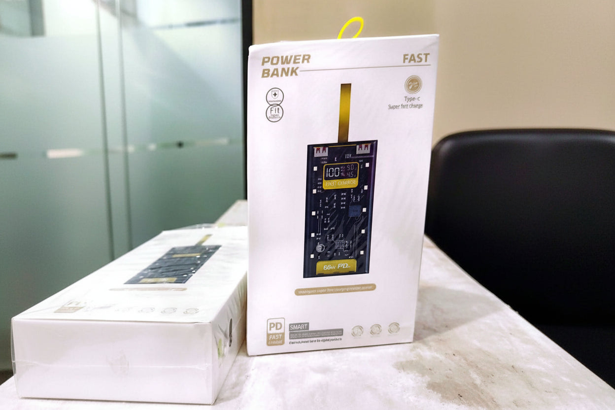 Power bank packaging with digital display on a white surface