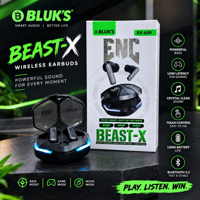 Bluk's Beast-X wireless earbuds in their charging case, shown next to their retail packaging box on a dark textured surface. The packaging is white with green and black accents, and the earbuds are black with blue LED lighting on the charging base.