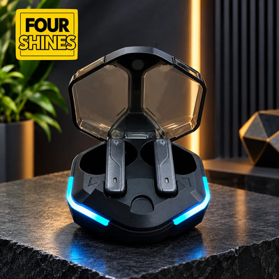 A black hexagonal wireless earbuds charging case with an open translucent lid and glowing blue LED accents, shown on a dark stone surface in a modern interior setting. A yellow 'FOUR SHINES' logo appears in the top-left corner.