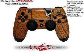 Wooden looking PS4 controller skin with text and graphics on a white background