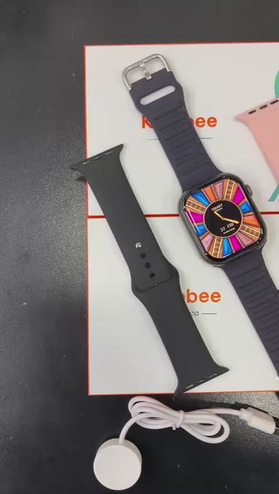 GW9 MAX smart watches with silicone bands in black, blue, and gray colors, displayed alongside their packaging.